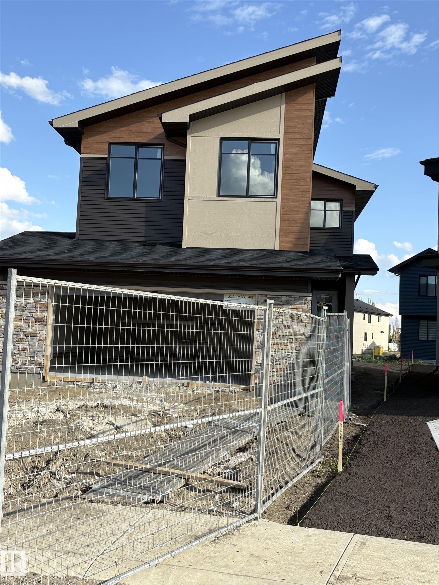 239 166 AV NE