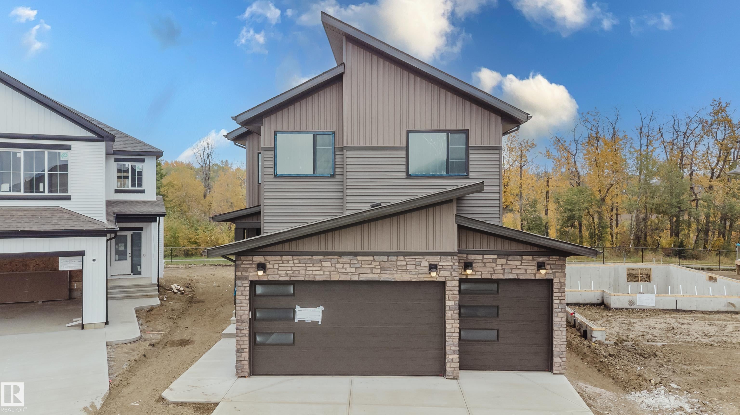 21112 26 AV NW