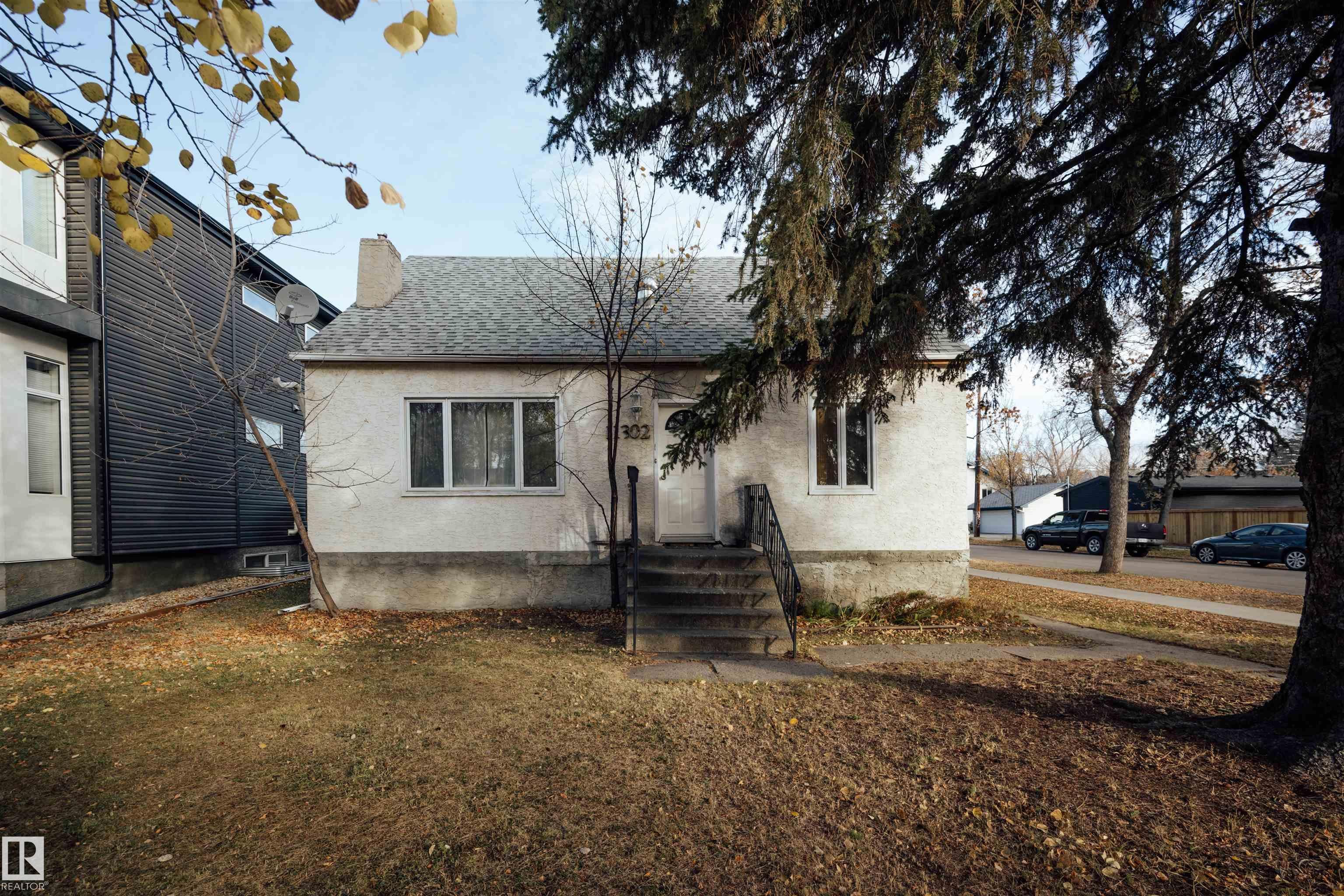11302 75 AV NW